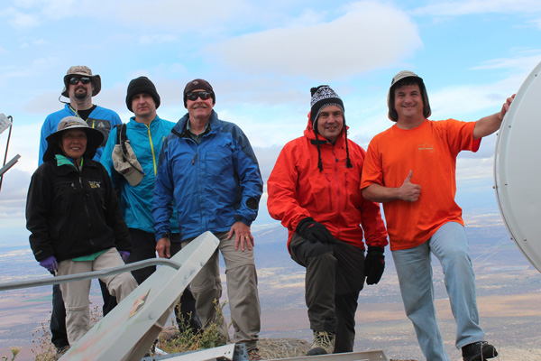 Climbing team on top of the Sierra Estrella