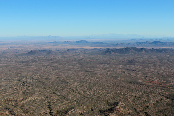 View to the SE towards Newman and Picacho Peaks and the Santa Catalina and Rincon Mountains