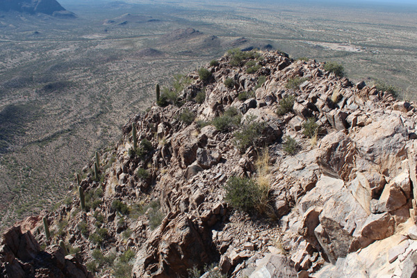 The upper rock face from the Sharp Peak summit