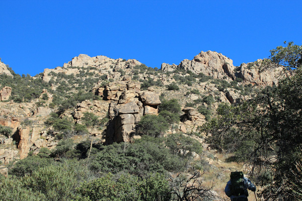 We climb towards Table Tooth and its east notch above left.