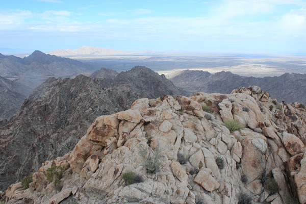 The Copper Mountains are on display to the north in distant sunshine