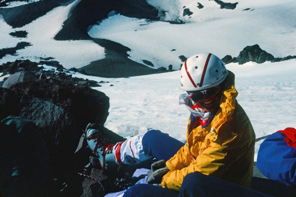 Linda on the Southeast Ridge. After climbing the Whitewater Glacier we reach the Southeast Ridge. Here we remove our crampons and coil our ropes for the climb of loose rock to the Red Saddle.