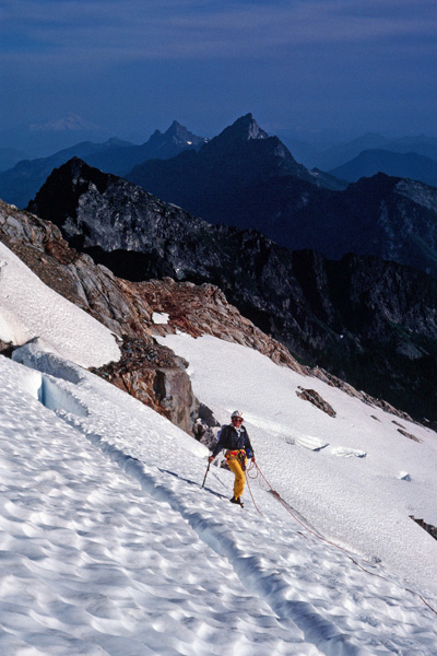 Linda climbing the glacier below the East Face of Sloan Peak