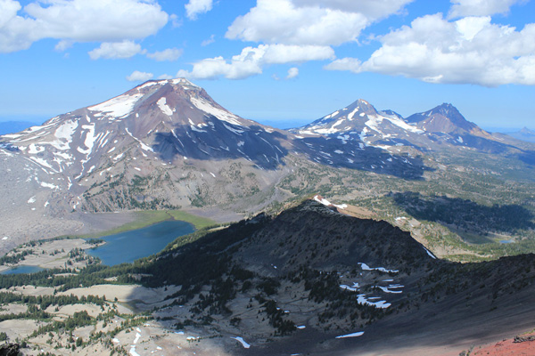 The Three Sisters from Broken Top South Peak. Green Lakes lie below to the left.