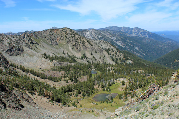 Looking into Cougar Basin and at Cougar Pond from the saddle