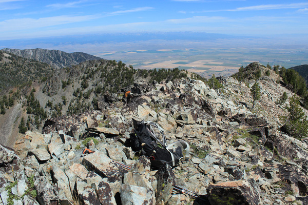 The summit of Cougar Pond SE Peak. A butterfly flutters by above my pack.