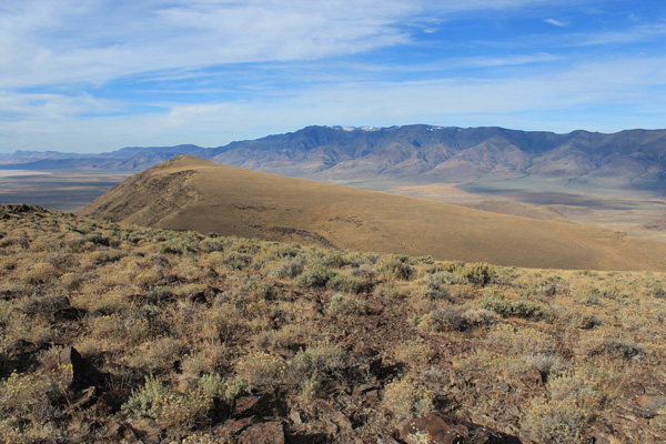 Steens Mountain rises high above to the west beyond Peak 6275, our second destination.