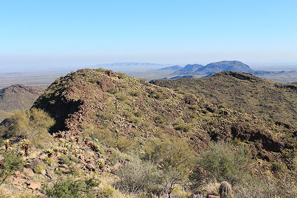 Jack Benchmark from the highpoint with the Silver Reef Mountains on the right and the Casa Grande Mountains in the distant center.