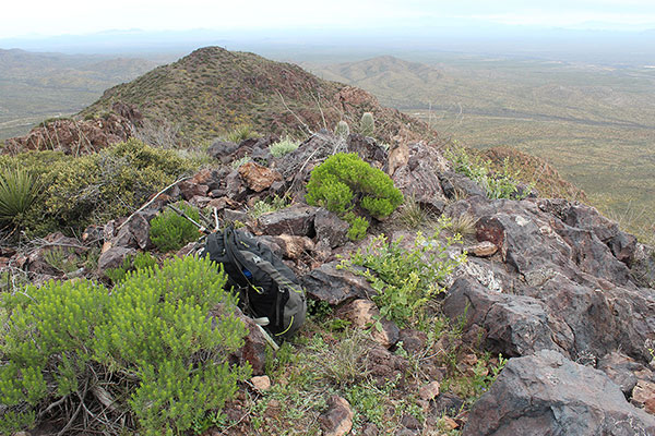 The Como Benchmark summit. The benchmark, itself, lies on a slab to the right of my pack.