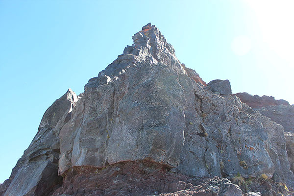 The basalt wall and summit pinnacle of Broken Top from the top of the Northwest Ridge
