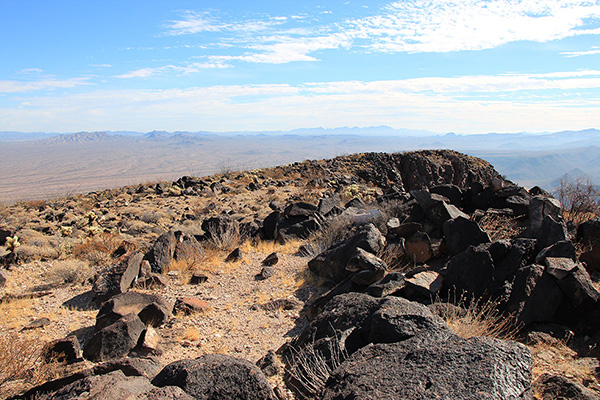 The Ajo Mountains rise on the horizon to the southeast from Growler Peak