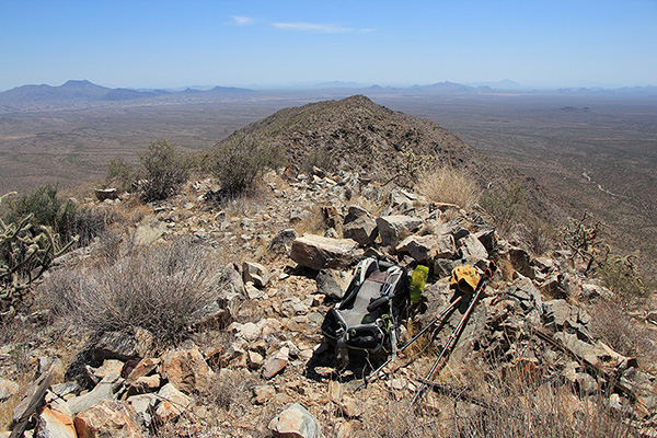 The Maricopa Peak summit rock cairn with summit registry buried within