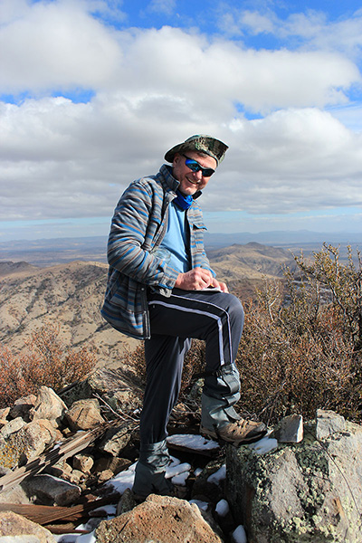 Michael writing in the Mohon Peak summit registry
