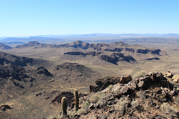 Looking southwest across the Sikort Chaupo Mountains towards the distant town of Ajo