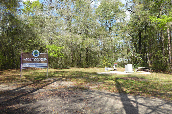 Approaching the marker at Walton County Lakewood Park (March 2022)