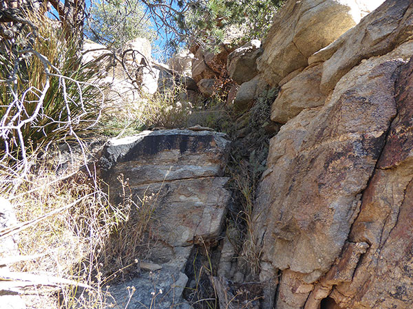 After climbing traverse we turn up and climb through this gap in the cliffs to reach the summit