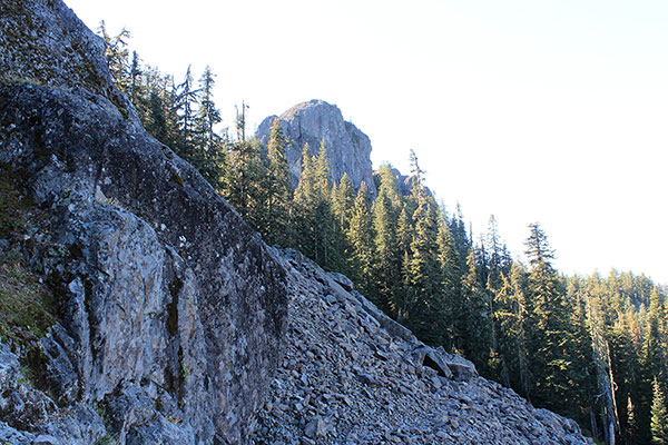 The Titbits Mountain Lookout site is on the top of the rock tower ahead