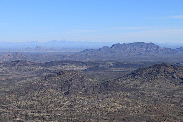 The Mesquite Mountains on the right and distant Baboquivari Peak on the left from Diaz Peak