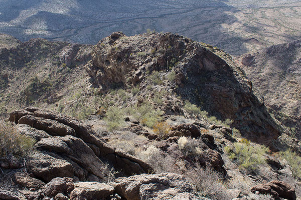 I begin my descent to the upper saddle from the Pinkley Peak summit