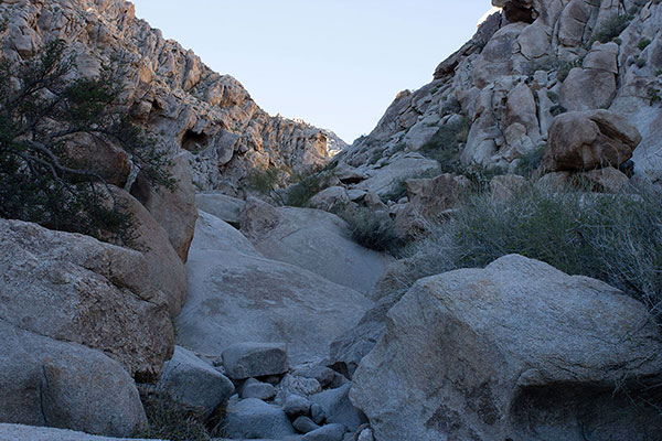 The canyon floor narrows above the large dry waterfall