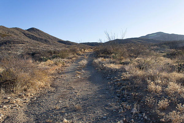 Hiking up E. Keith Ranch Road towards higher hills in the Johnny Lyon Hills